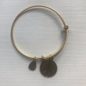 Gold peace sign bracelet